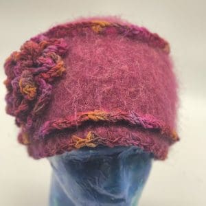 Medium Cloche in Pinks, With Double Row Embellishment at Bottom of Brim and Flower