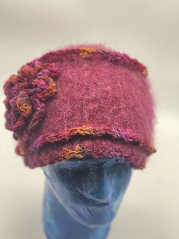 Medium Cloche in Pinks, With Double Row Embellishment at Bottom of Brim and Flower